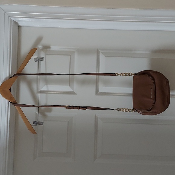 Michael Kors crossbody purse/bag. The strap is adjustable. The color is brown. - Picture 1 of 9
